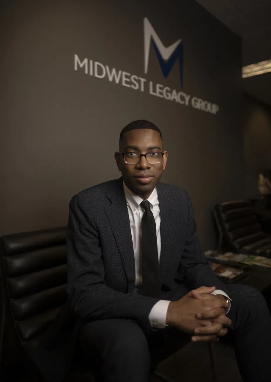 Jeremy Johnson, founder of JBJ Financial Services, seated in his office